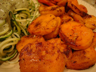 Roasted Sweet Potatoes and Carrots on plate close up next to spiralized zucchini noodles - 17