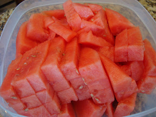 Sliced watermelon in clear container