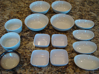 Various sized dishes and bowls on countertop - 39
