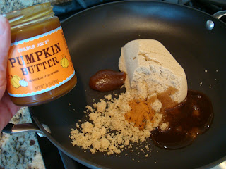 Pumpkin butter, butter, water, cinnamon, maple syrup and brown sugar in skillet