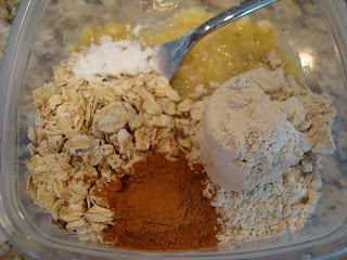 Ingredients needed to make Breakfast Cookies in clear container with spoon - 9