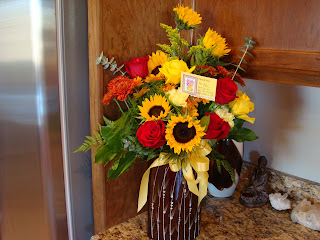 Vase of flowers on countertop - 3