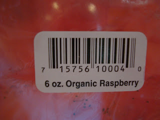 Barcode on raspberries showing 6 oz size and Organic Raspberry 