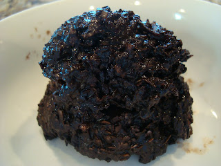 One vegan dark chocolate coconut snowball in shallow dish - 41