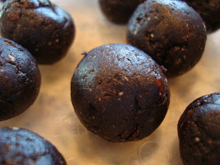Container of Raw Vegan Dark Chocolate Cherry Balls