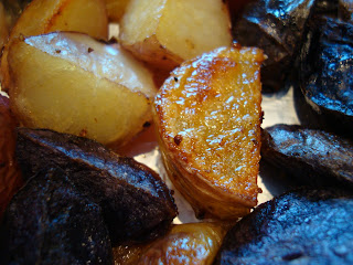 Crispy skin close up of mixed colored potatoes 