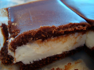 Close up of crust, center and chocolate topping of Creme de Menthe Bars