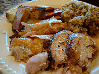 Plated thanksgiving meal of potatoes, stuffing and turkey