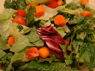 Mixed greens with sliced vegetables