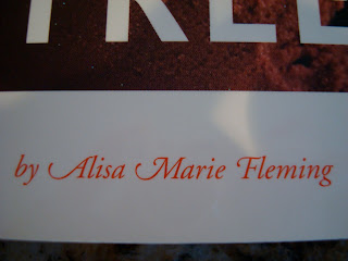 Close up of Authors name: Alisa Marie Fleming