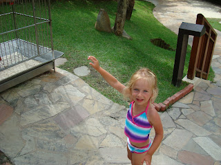 Young girl playing tour guide