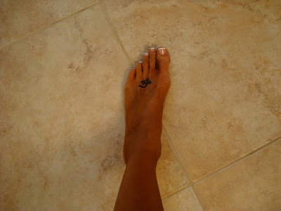 Foot showing fresh spray tan