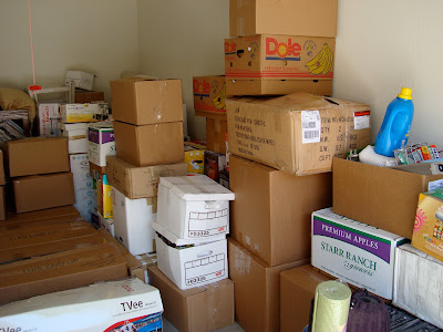 Packed moving boxes stacked on top of one another