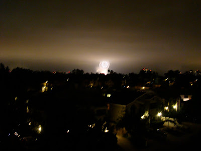 White large firework going off in distance - 9