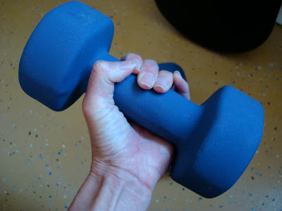 Hand lifting blue weight - 41