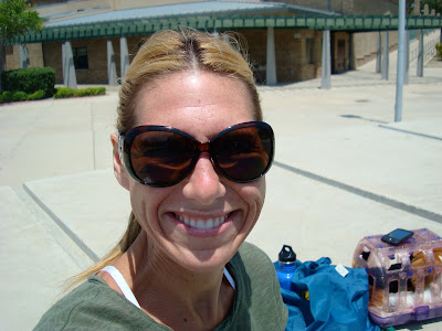 Woman in sunglasses smiling