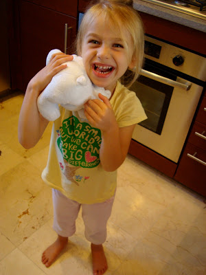 Young girl hugging stuffed animal - 13