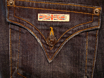 Hudson brand label on pocket of jeans