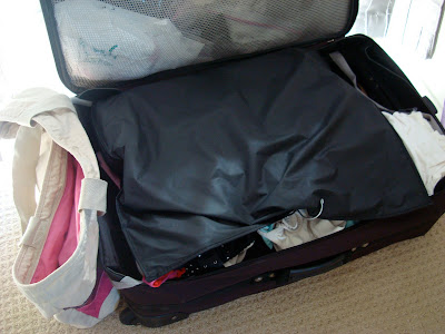 Open suitcase fully packed