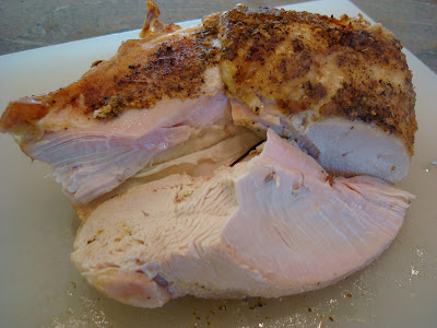 Turkey being carved on cutting board