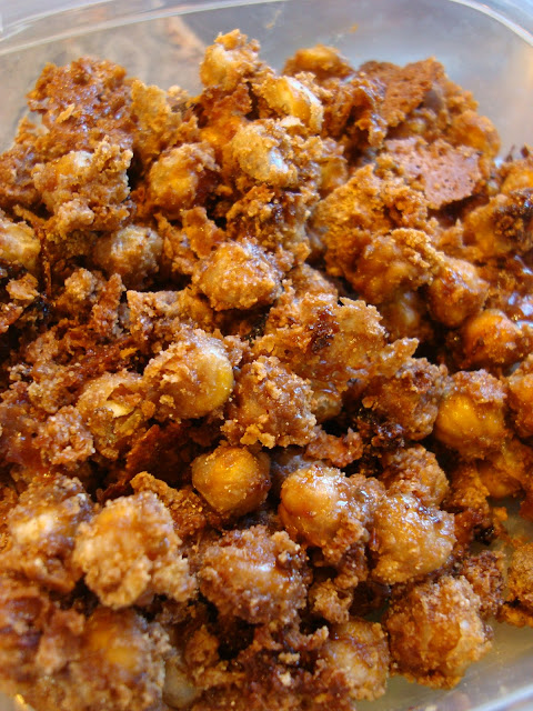 Close up of Cinnamon Sugar Peanut Buttery Chickpea "Peanuts" with Peanut Flour in container