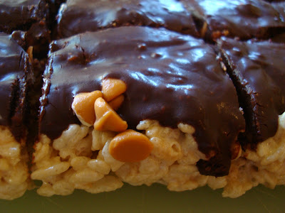 Close up of Butterscotch Rice Krispy Treats with Vegan Chocolate Frosting showing butterscotch chips