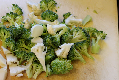 Broccoli and Cauliflower Mixture on cutting board