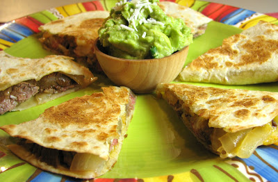 flank steak, caramelized onion and extra sharp cheddar quesadillas