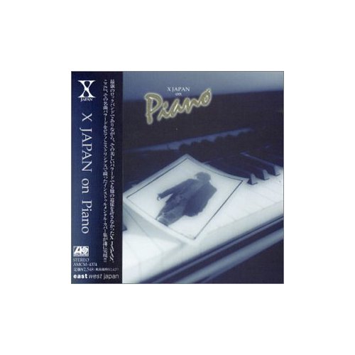 [X+On+Piano.jpg]