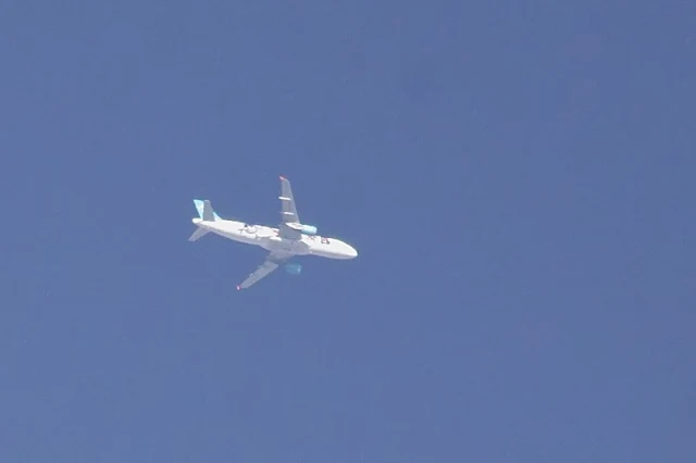 Air Asia airplane with Tourism Malaysia Logo-Airbus A320-216