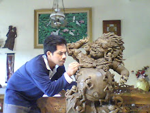 Ponimin working on his artwork - Against Evil