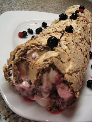 Meringue roulade with berry fruits