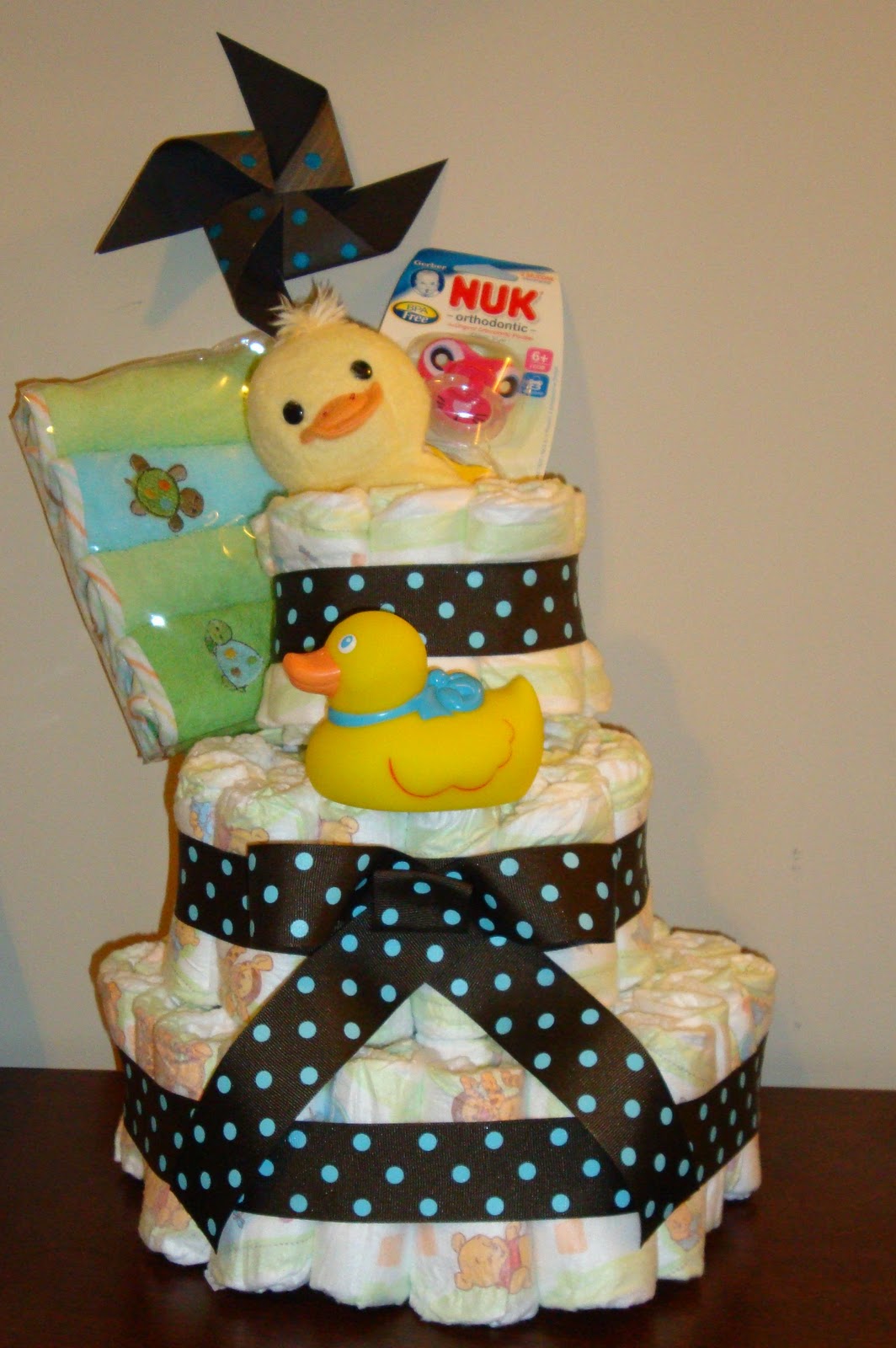 Embracing a Healthy Family How to Make a Huggies Diaper Cake with Glue
