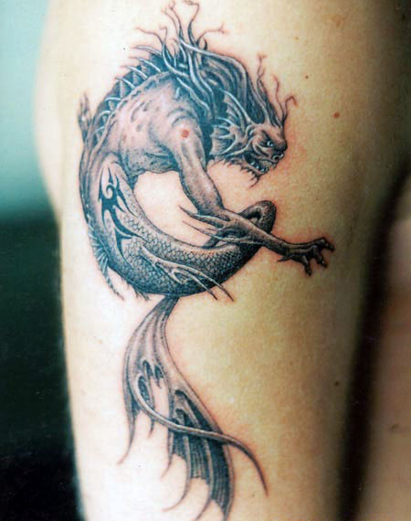 chinese dragon tattoo on arm. hair Tribal dragon tattoo