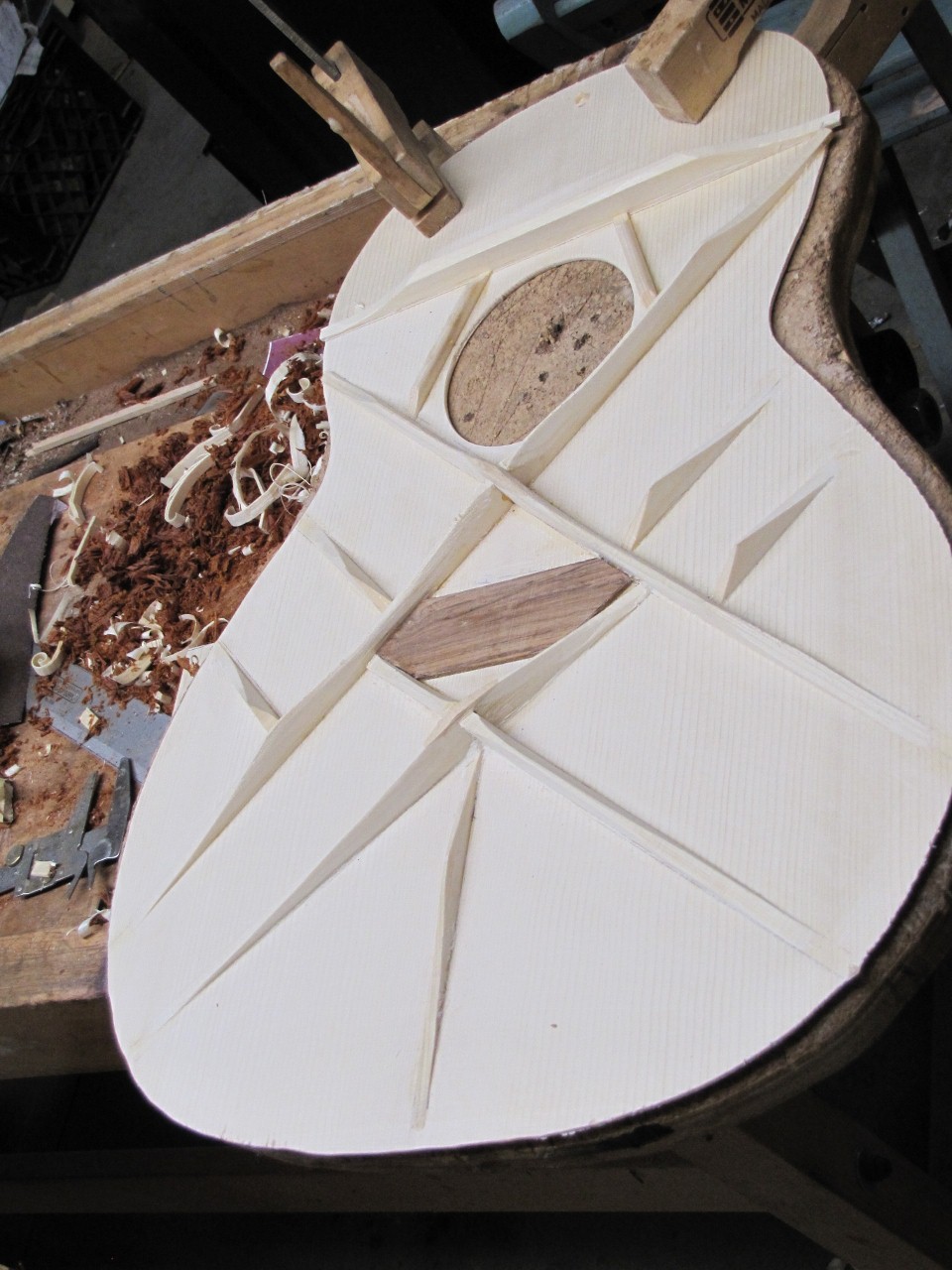 Kinnaird Guitars in the mountains Braces, carving and gluing