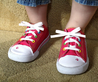 Being 8 months pregnant, I can't help my toddlers tie their shoelaces.