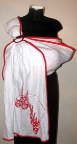 Ένα πολύ ιδιαίτερο sling από εξαιρετικό λινό, για μια πιο ξεχωριστή εμφάνιση, σε βάφτιση ή καλοκαιρινό γάμο