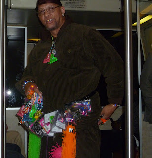 guy on subway selling trinkets that light up