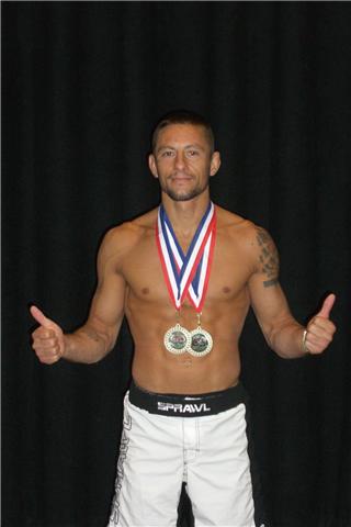 [Brian+with+medals+abu+dhabi+Aug+09.jpg]