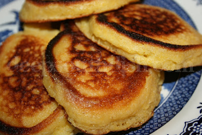 A classic southern recipe, cornmeal hoecakes are little pan fried cornmeal medallions that are at home as breakfast, as much as they are as a side dish with a mess o' greens, and just about anything else!