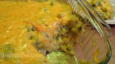 A well loved casserole of broccoli, rice and cheese, uses canned cheddar cheese soup and cream of mushroom for the sauce and is topped with your favorite shredded cheese.