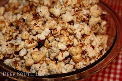 Homemade kettle style popcorn, popped stovetop in a sugared oil and butter blend and tossed with Cajun seasoning, mixed with seasoned salt and cinnamon.