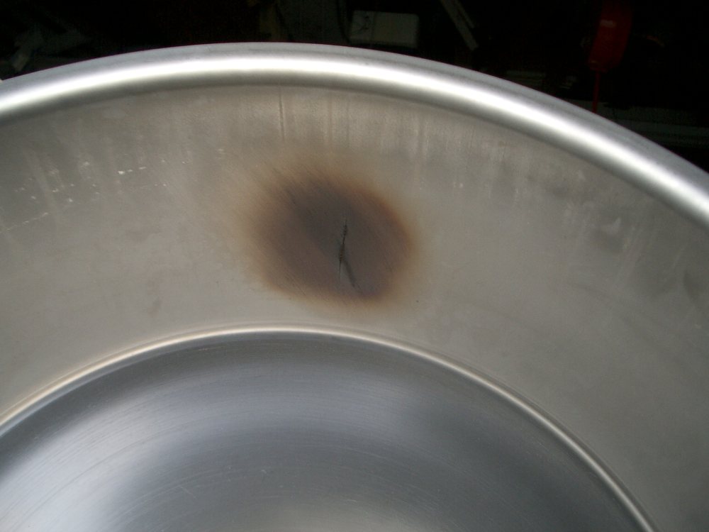 [cracked+stainless+tank.jpg]