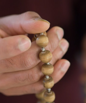 Chanting mantras 108 times without mala beads