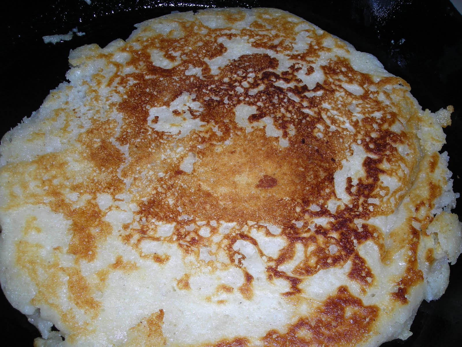 backwoods exposed Nana's hoe cake cooked in cast iron skillet