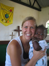 A visiting volunteer with a Child