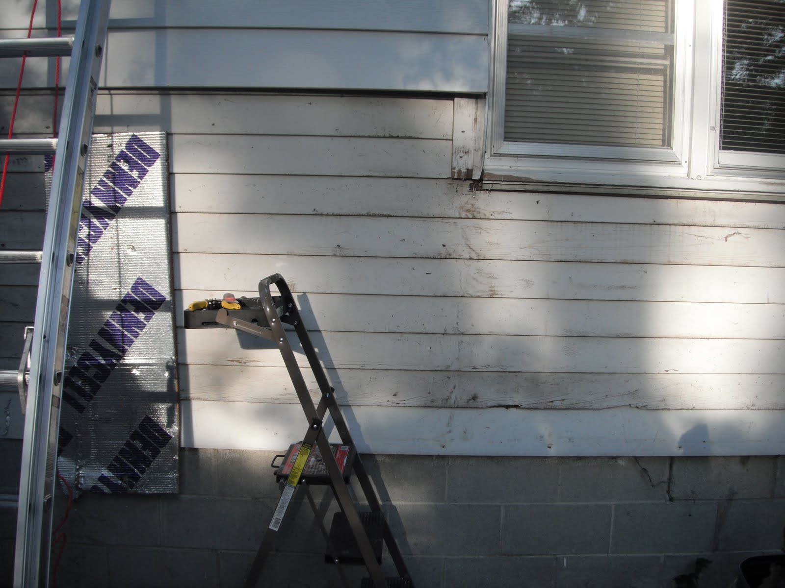 New Hampshire St. Bungalow Aluminum Siding Removal