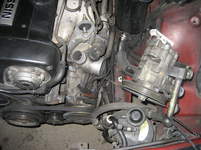 Nissan power steering pump removal #9