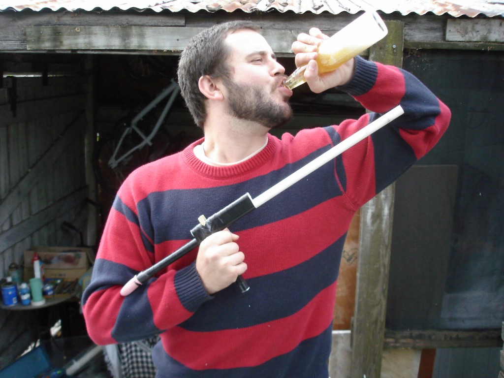 [posing+with+glove+gun+(2).JPG]