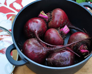 Rub the oil all over the beet skins.